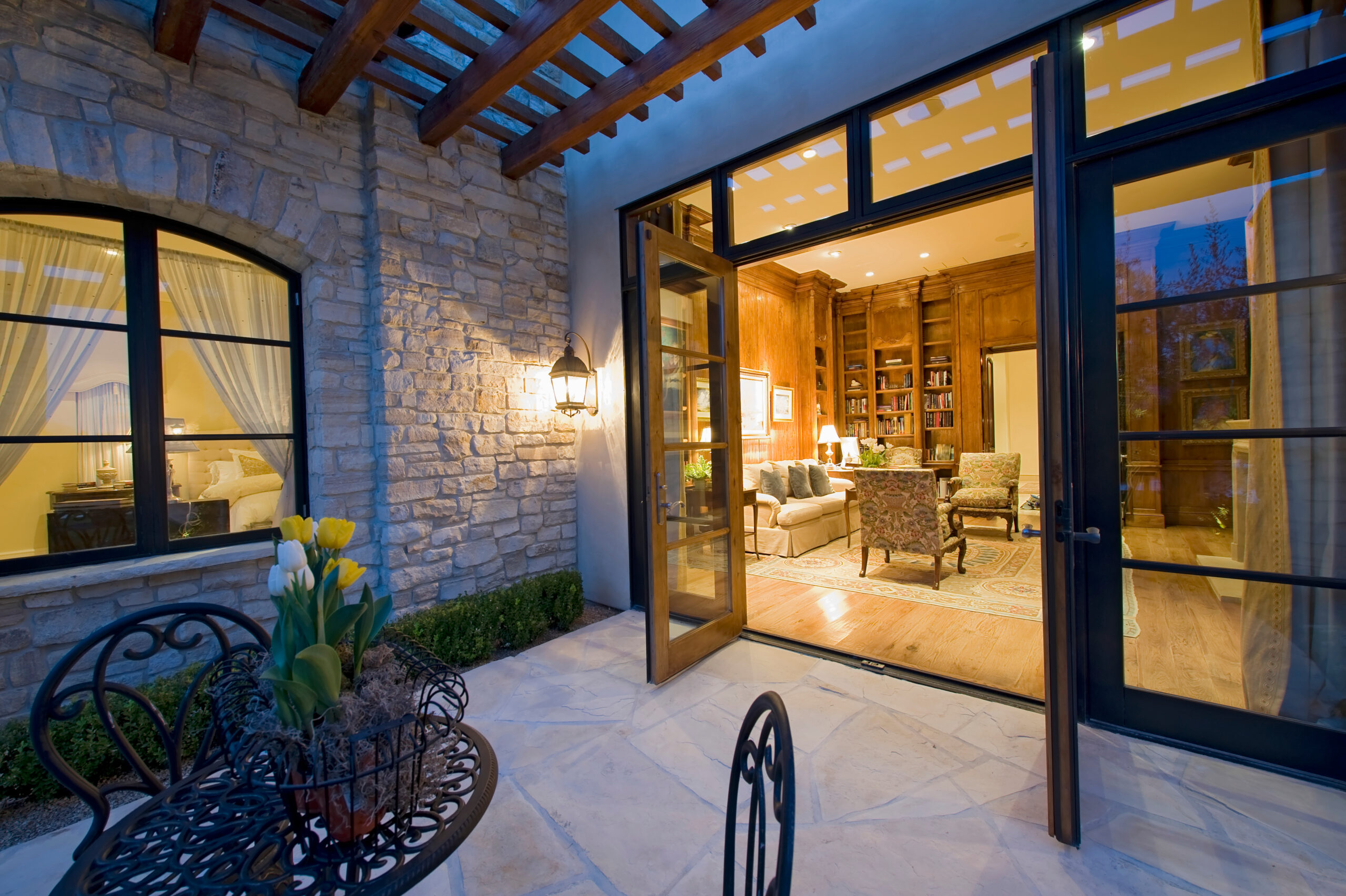 An open patio door leading to an outdoor seating area.